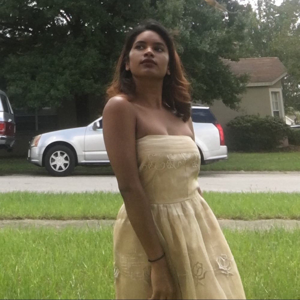 Gold mini strapless dress